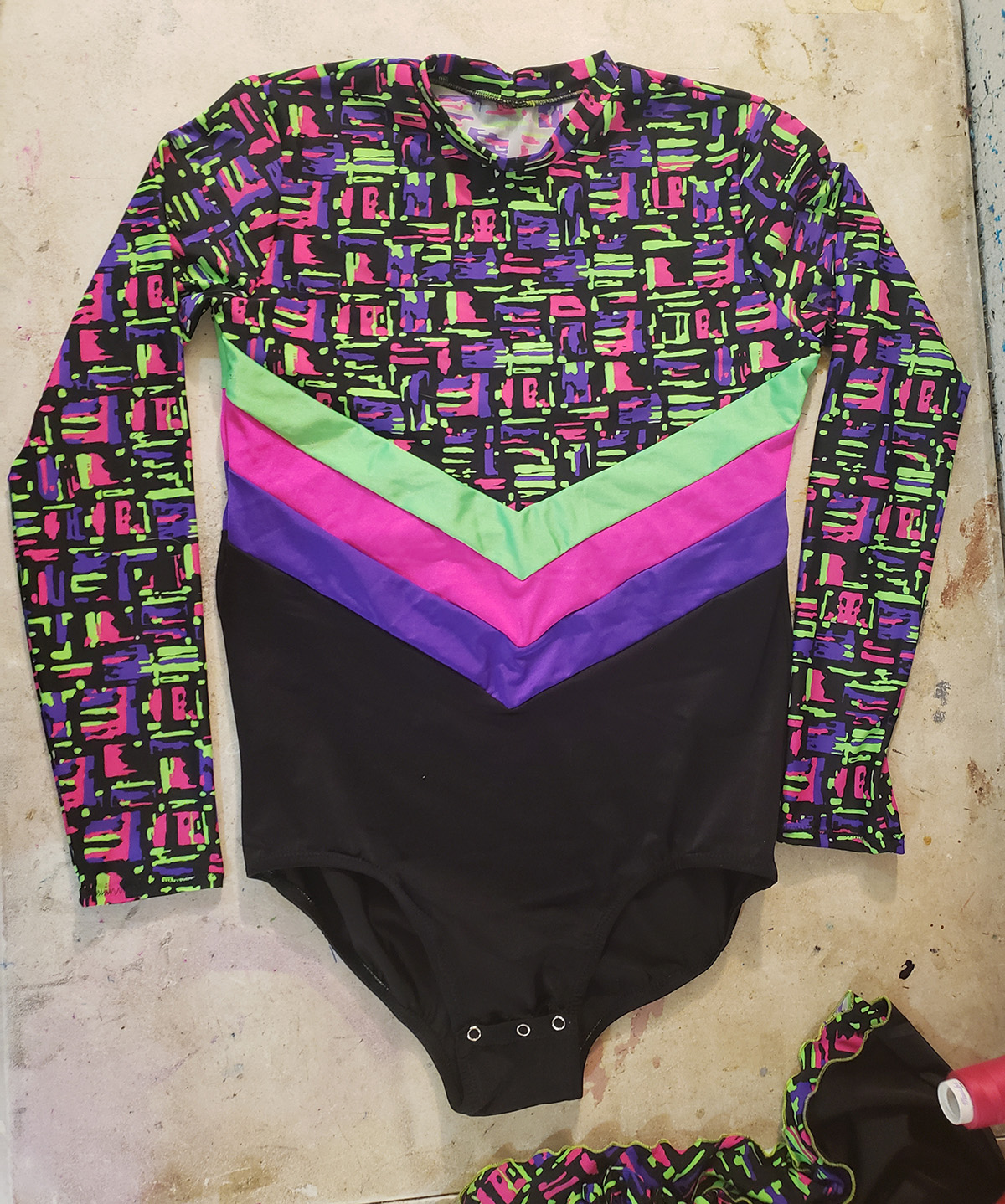 A mens skating bodyshit made from obnoxious neon colours.