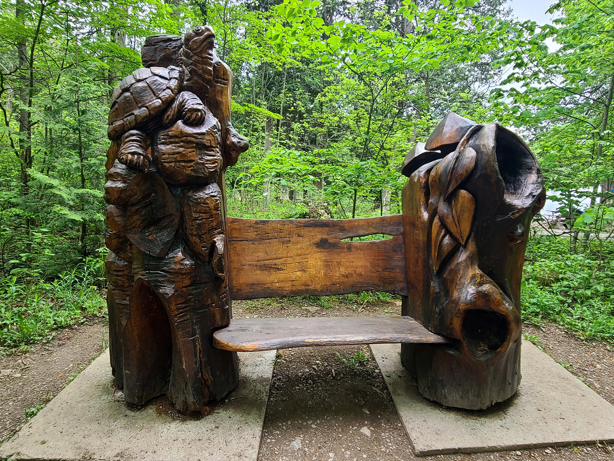 A carved wooden bench.