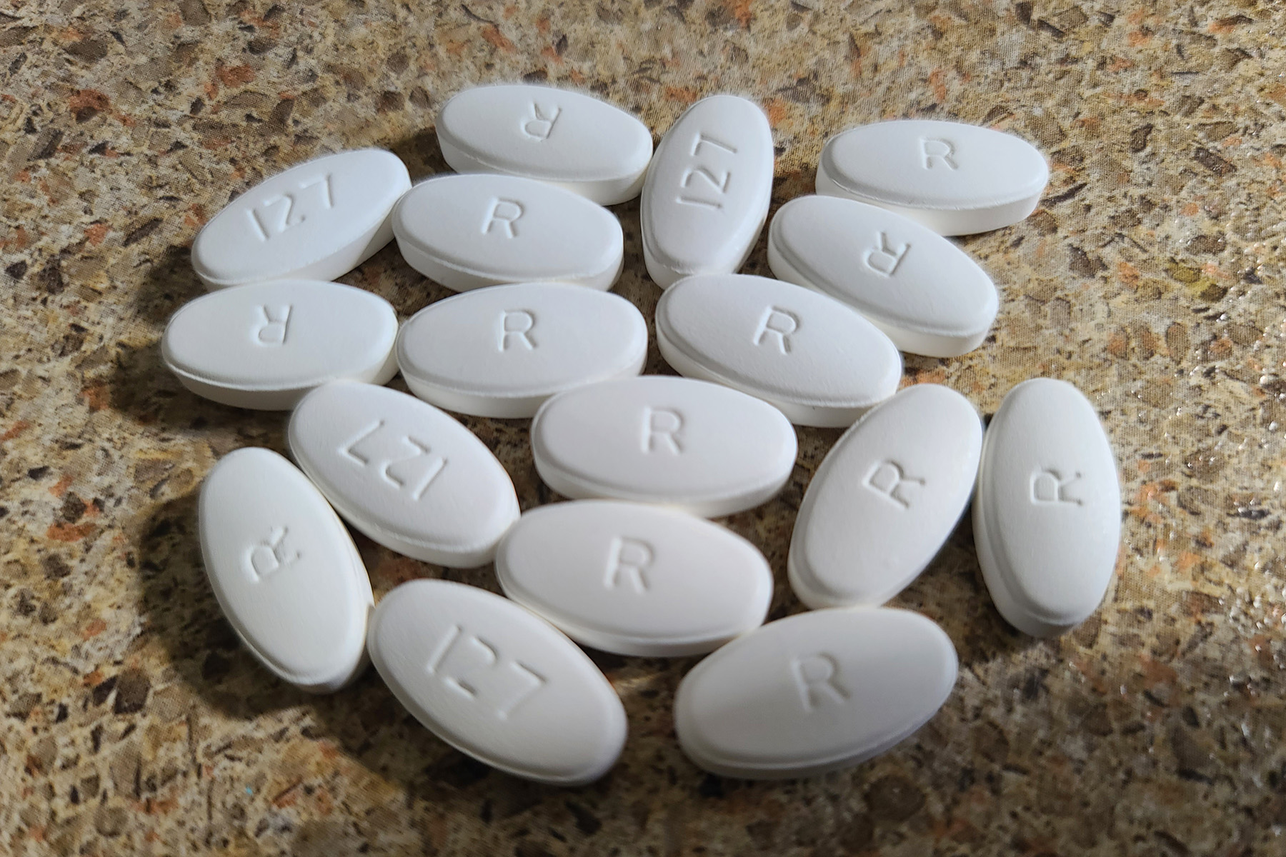 17 Ciprofloxacin pills on a counter.